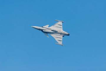 Gripen 39d jet aircraft soaring through the sky.