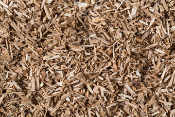 pieces of wood chip smoking element giving flavor and taste many elements pattern natural beige.