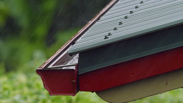 Slow Motion Heavy Rain Rooftop to Gutter Medium, 4K