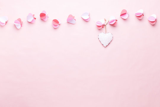 Colorful Paper Garland Of Hearts On The Living Coral Background. Valentine Day Greeting Cards.