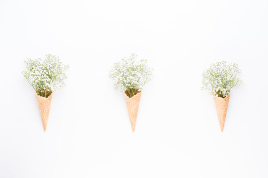 Fototapeta Flowers composition. Gypsophila flowers on pastel pink background. Flat lay, top view, copy space