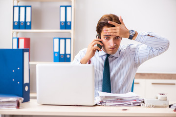 Businessman disgusted with cockroaches in the office