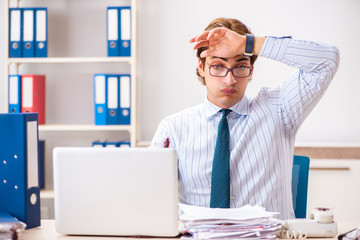 Businessman disgusted with cockroaches in the office