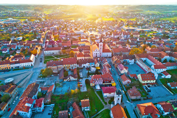 Colorful sunset above medieval town of Krizevci aerial view