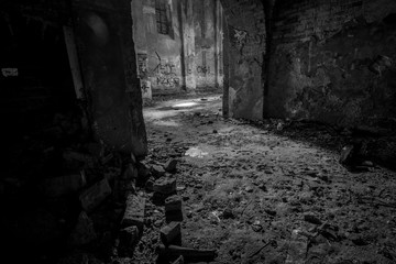 Abandoned interior of a church standing in the middle of the forest, completely empty.