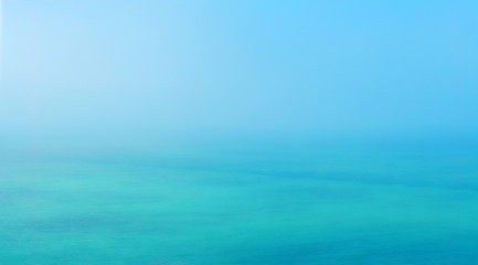 Sea horizon in the fog. Ocean merging with the sky. Panoramic view. Beauty nature background