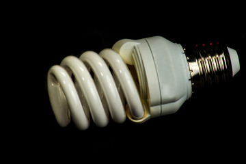 Light bulb on black background
