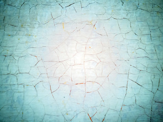Close-up  of cracked paint on  metal wall