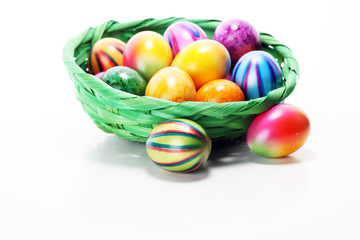 Fototapeta na wymiar Basket of Easter eggs on table. easter decoration