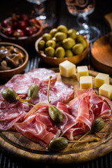 Serrano ham platter with variation of appetizers