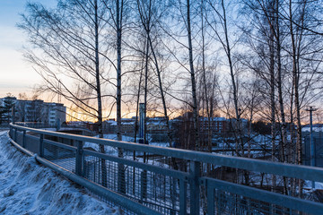 Winter view behind a fence