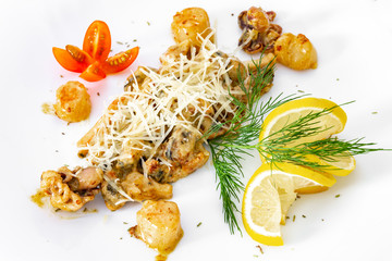 Appetizing, juicy, seafood on a white plate, a dish for the menu and advertising.
