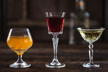 Image of colorfull coctails in the bar, mixology concept