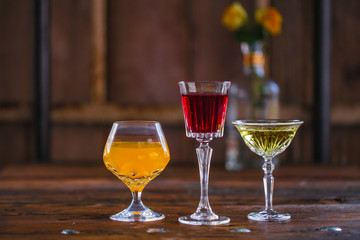 Image of colorfull coctails in the bar, mixology concept