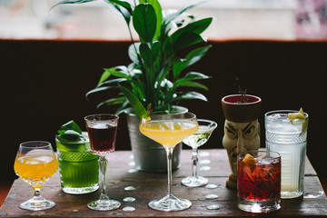 Image of colorfull coctails in the bar, mixology concept
