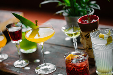 Image of colorfull coctails in the bar, mixology concept