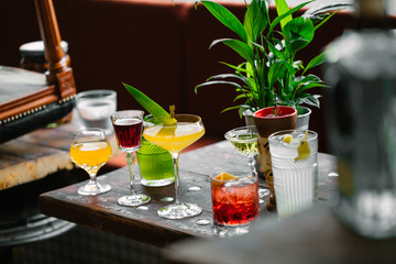 Image of colorfull coctails in the bar, mixology concept