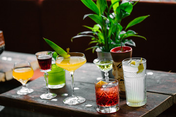 Image of colorfull coctails in the bar, mixology concept