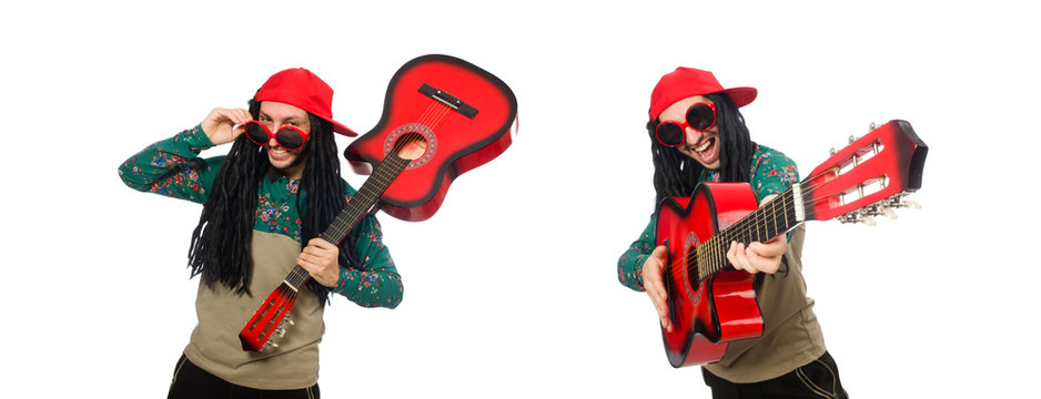 Man with guitar in musical concept on white