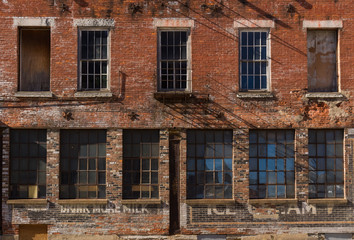 Fototapeta na wymiar Old brick storefront in Midwest city.