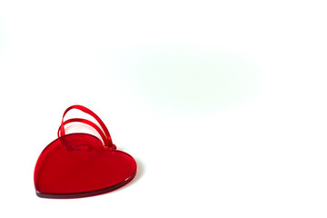  A red glass heart. Valentine's day concept. Copy space.