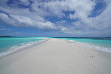 Amazing turquoise water view along a beach in the Maldives