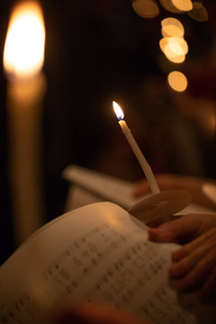 Carolers By Candle Light