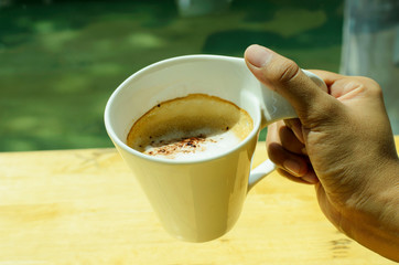 Cup of capuccino coffee drinks on coffee break