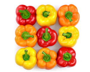 yellow orange and red sweet bell pepper isolated on white background. Top view. Flat lay