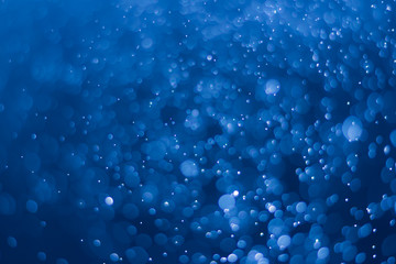 abstract deep blue background with blur bokeh light effect