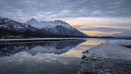 Fototapeta na wymiar Alaska reflection winter mountains and lake