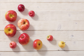 apples on wooden white background