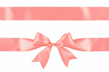 Red satin ribbon bow isolated on white background