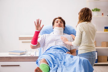 Loving wife looking after injured husband in hospital 