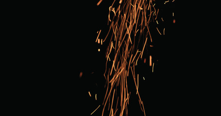 hot sparks falling from above black background