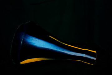 Vase of conical form on a black background