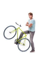 Fototapeta na wymiar Young man with cycle isolated on white