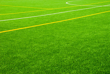 Football field background with white and yellow line. Sport texture.