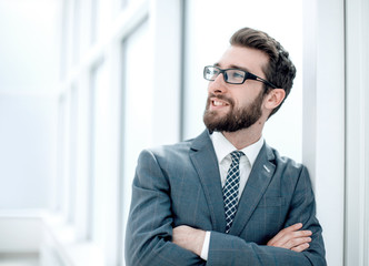 close up.pensive businessman standing in the office