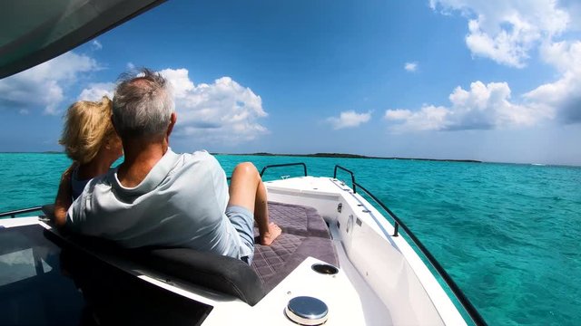 Caucasian seniors sailing on luxury sail boat Bahamas