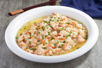 Shrimp balls with garlic sauce in a white dish