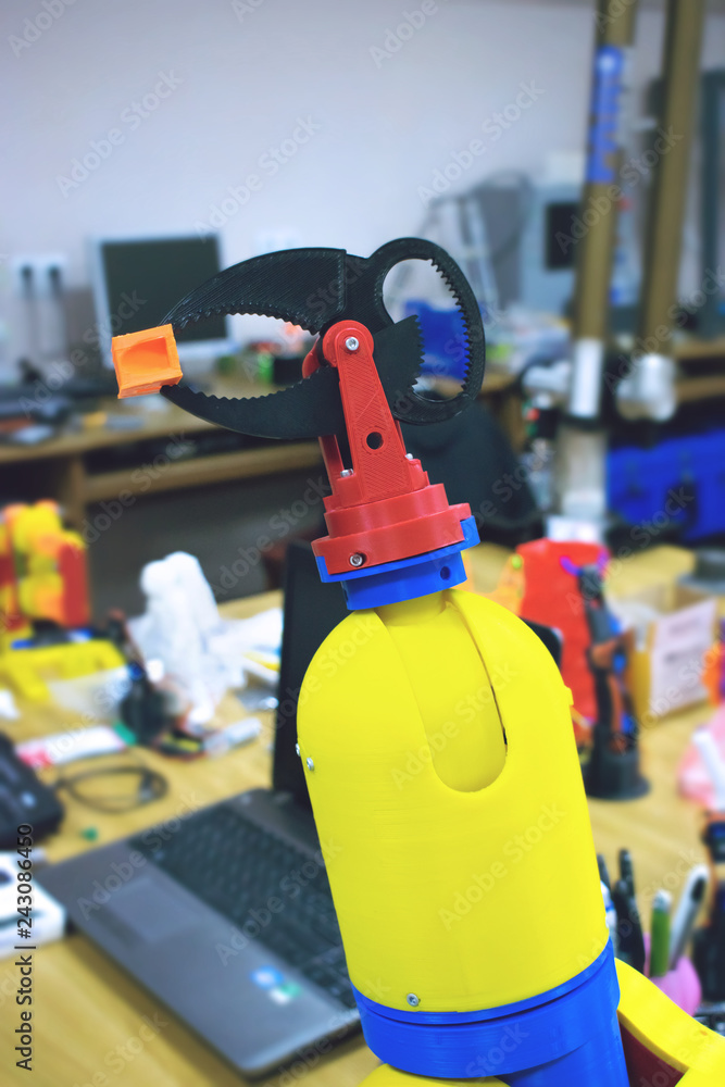Poster 3d printed robot clamp, arm, holder. plastic manipulator, robotic hand machine tool printed on three