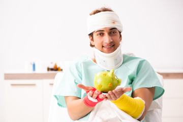 Young injured man staying in the hospital 