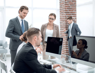 Bank employees sitting at the Desk