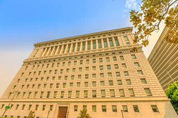 Perspective view of historic building Hall of Justice, 1925. Urban cityscape. The courthouse is one of oldest surviving buildings in Los Angeles Downtown, California, United States. Front view.