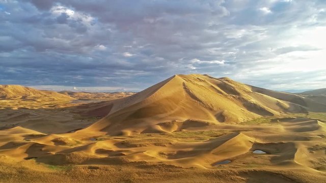 Barkhans in Mongolia sandy dune desert Mongol Els near lake Durgen Nuur. Khovd province, Western Mongolia.