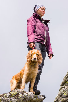 girl with a dog in the mountains of the Carpathians, Ukraine, May 2016