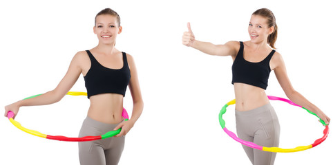 Young woman with hula hoop isolated on white 