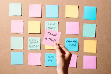 Motivational word "Take a trip" on pink card