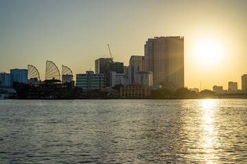 Sunset Reflection on Saigon River in Ho Chi Minh City